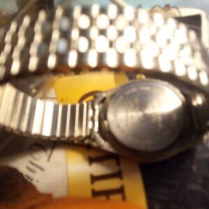 Watches in a bag. 1st watch is Milan Tuesday mln 948 silver bezel 100